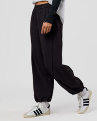 Woman wearing Stitch Up Track Pant - Black | Model:Taneisha | Size:XS | Thumbnail Index: 0