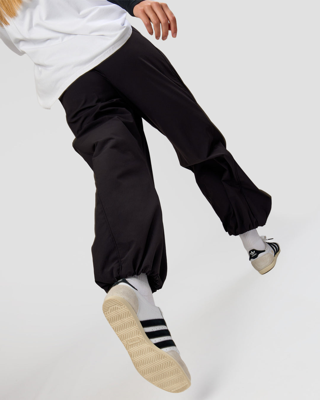 Woman wearing Stitch Up Track Pant - Black | Model:Taneisha | Size:XS - view 8