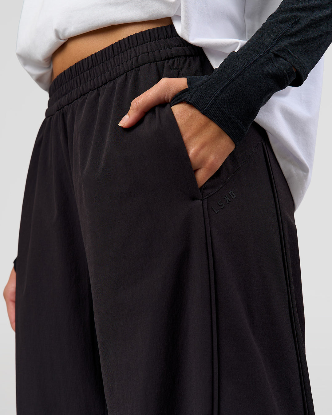 Woman wearing Stitch Up Track Pant - Black | Model:Taneisha | Size:XS - view 11