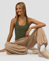 Woman wearing Stitch Up Track Pant - Warm Smoke | Model:Taneisha | Size:XS | Thumbnail Index: 3