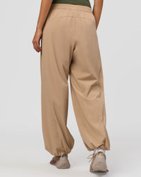 Woman wearing Stitch Up Track Pant - Warm Smoke | Model:Taneisha | Size:XS | Thumbnail Index: 4