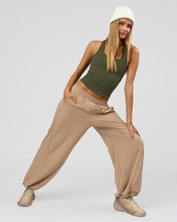Woman wearing Stitch Up Track Pant - Warm Smoke | Model:Taneisha | Size:XS | Thumbnail Index: 5