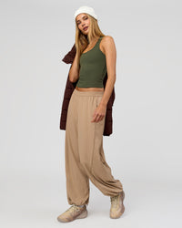 Woman wearing Stitch Up Track Pant - Warm Smoke | Model:Taneisha | Size:XS | Thumbnail Index: 6