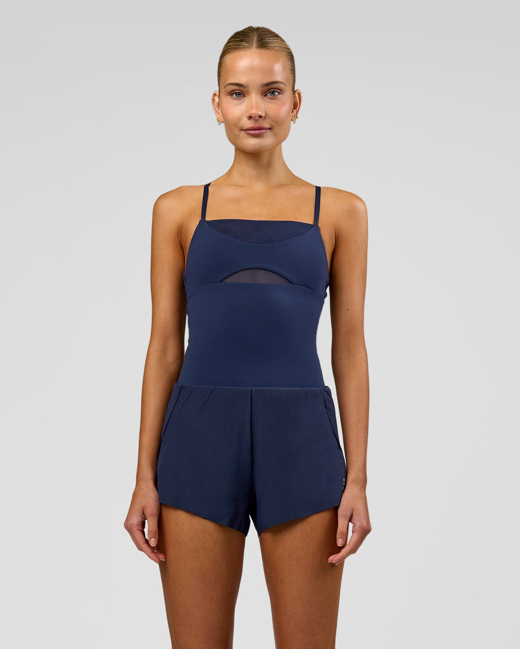 Woman wearing Tia-Clair Toomey-Orr Legacy 3" Run One-Piece - Future Navy | Model:Taneisha | Size:XS