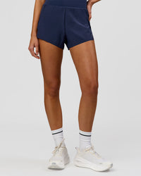 Woman wearing Tia-Clair Toomey-Orr Legacy 3" Run One-Piece - Future Navy | Model:Taneisha | Size:XS | Thumbnail Index: 10