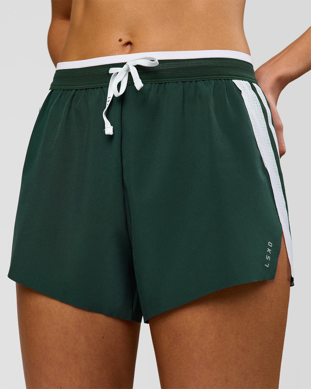 Woman wearing Trackline Accelerate 3" High-Rise Running Short - Midnight Green-White | Model:Taneisha | Size:XS - view 3