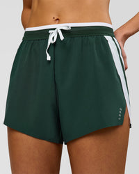 Woman wearing Trackline Accelerate 3" High-Rise Running Short - Midnight Green-White | Model:Taneisha | Size:XS | Thumbnail Index: 2
