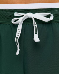 Woman wearing Trackline Accelerate 3" High-Rise Running Short - Midnight Green-White | Model:Taneisha | Size:XS | Thumbnail Index: 10