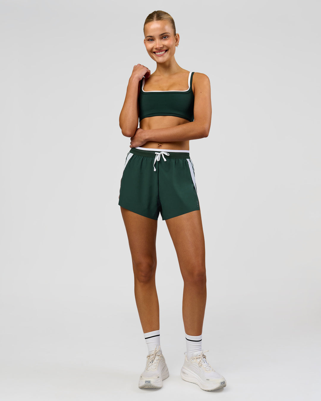 Woman wearing Trackline Accelerate 3" High-Rise Running Short - Midnight Green-White | Model:Taneisha | Size:XS - view 18