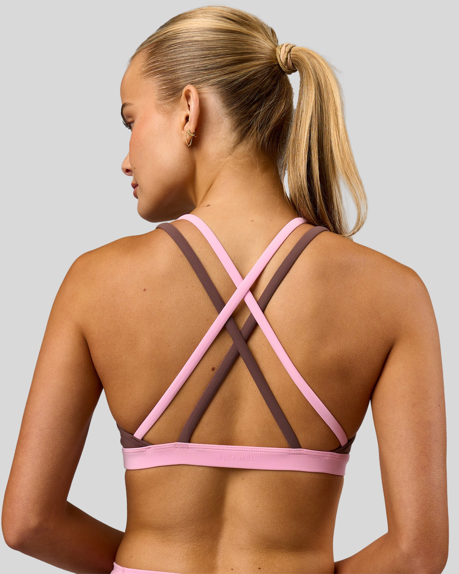Woman wearing Velocity Bralette Sports Bra - Cocoa Powder-Pink Rose | Model:Taneisha | Size:XS