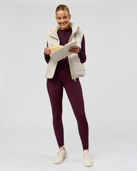 Woman wearing AeroFLX+ Long Sleeve Half Zip - Cherry Lacquer/Cherry Laquer | Model:Taniesha | Size:XS | Thumbnail Index: 13