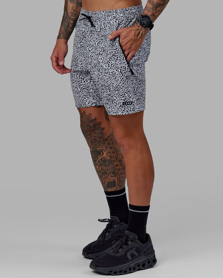 Man wearing Rep 7" Performance Short - Spotty White-Black