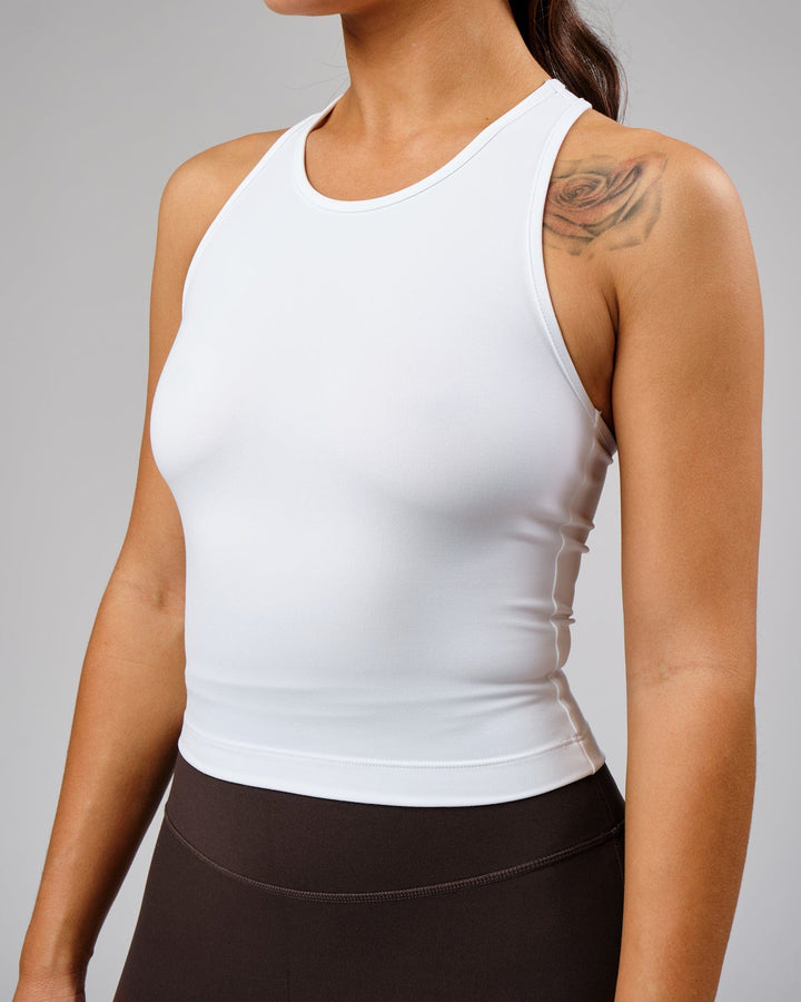 Woman wearing Flow Performance Tank - White
