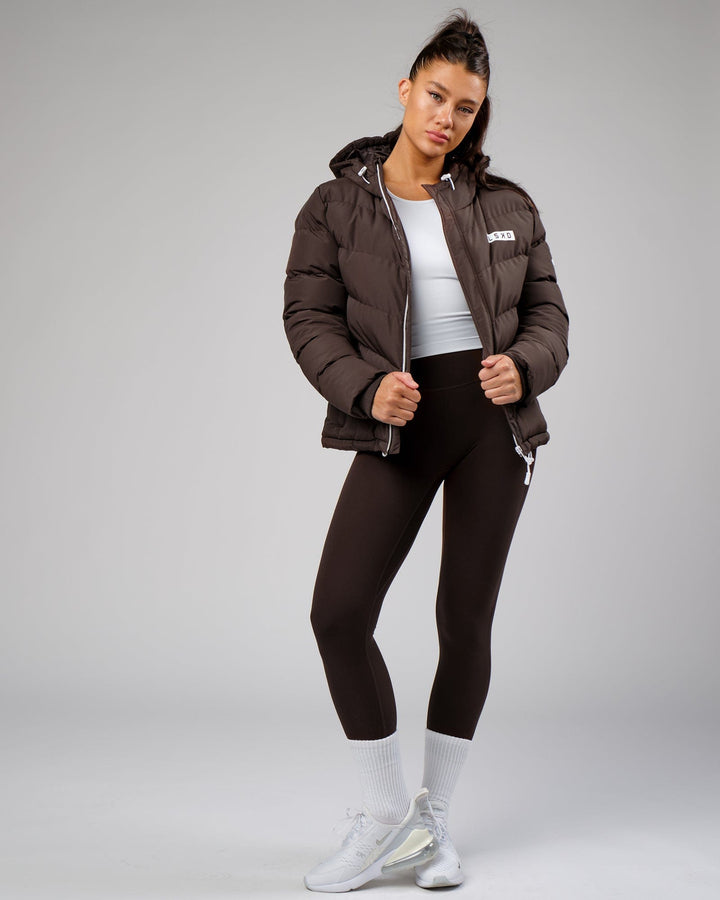 Woman wearing Flow Performance Tank - White