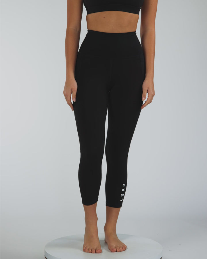 Woman wearing Flux 7/8 Length Tight - Black