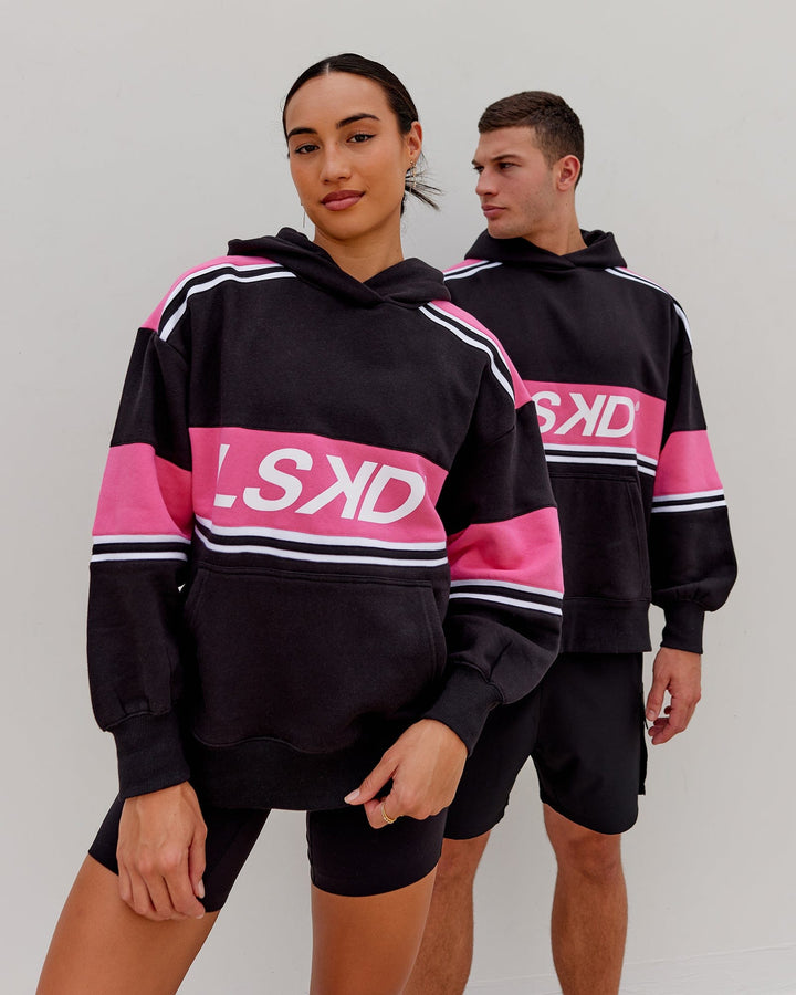 Man and Woman wearing Unisex A-Team Hoodie Oversize - Black-Flamingo