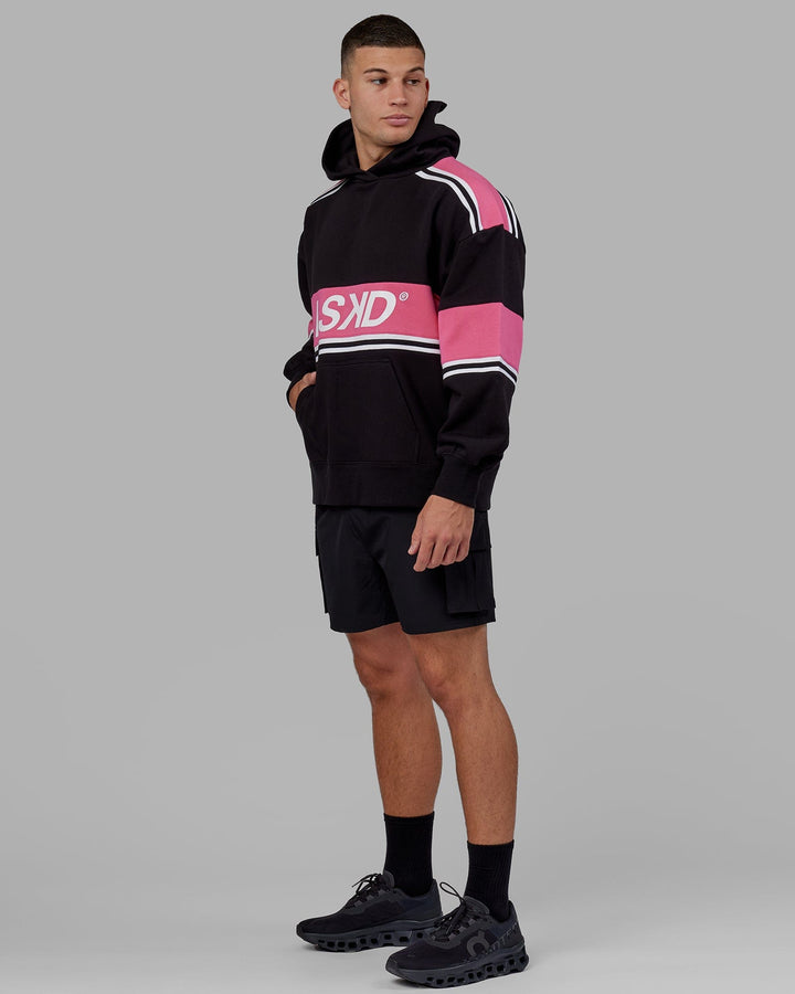 Man wearing Unisex A-Team Hoodie Oversize - Black-Flamingo