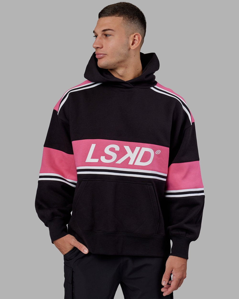 Man wearing Unisex A-Team Hoodie Oversize - Black-Flamingo