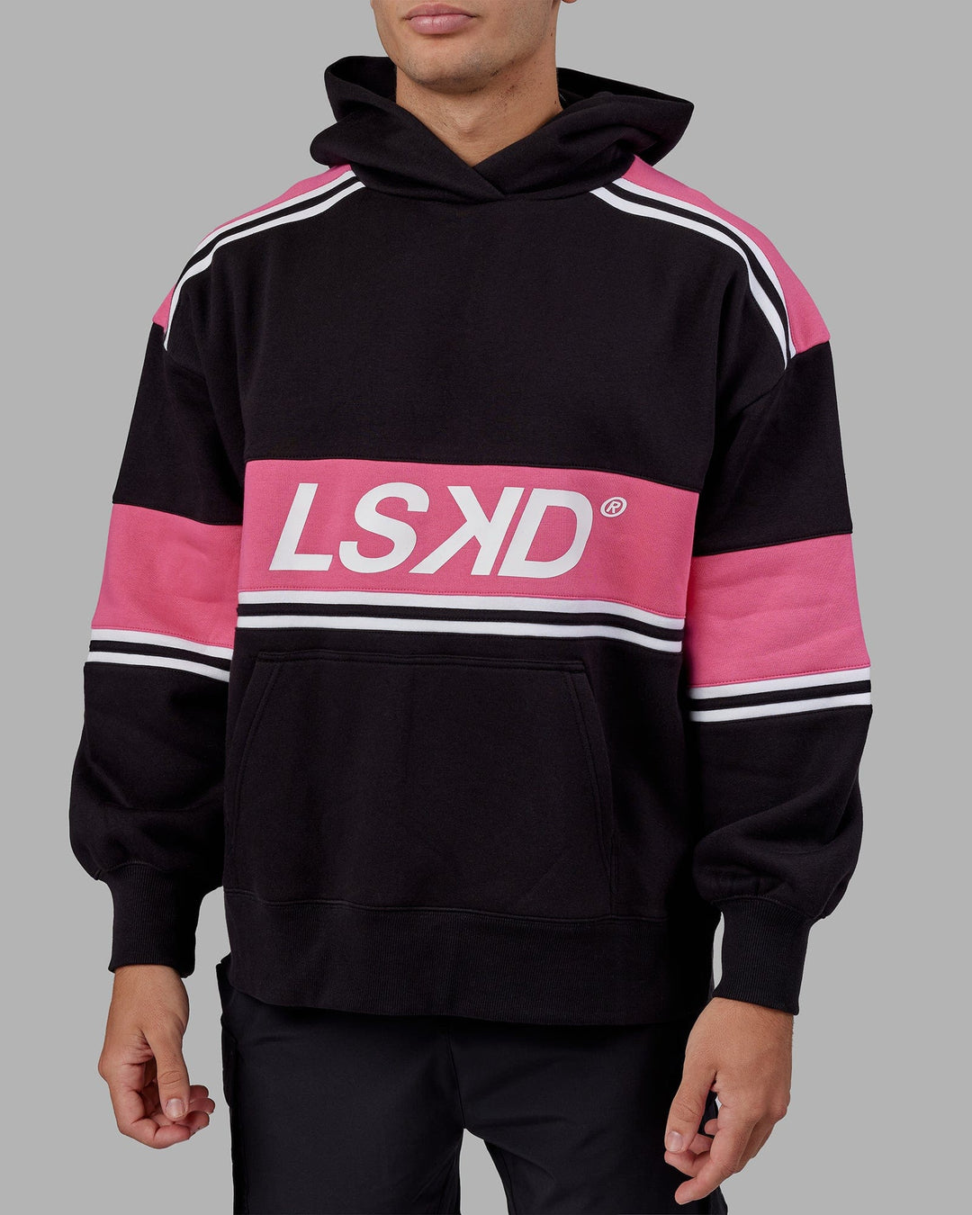 Man wearing Unisex A-Team Hoodie Oversize - Black-Flamingo
