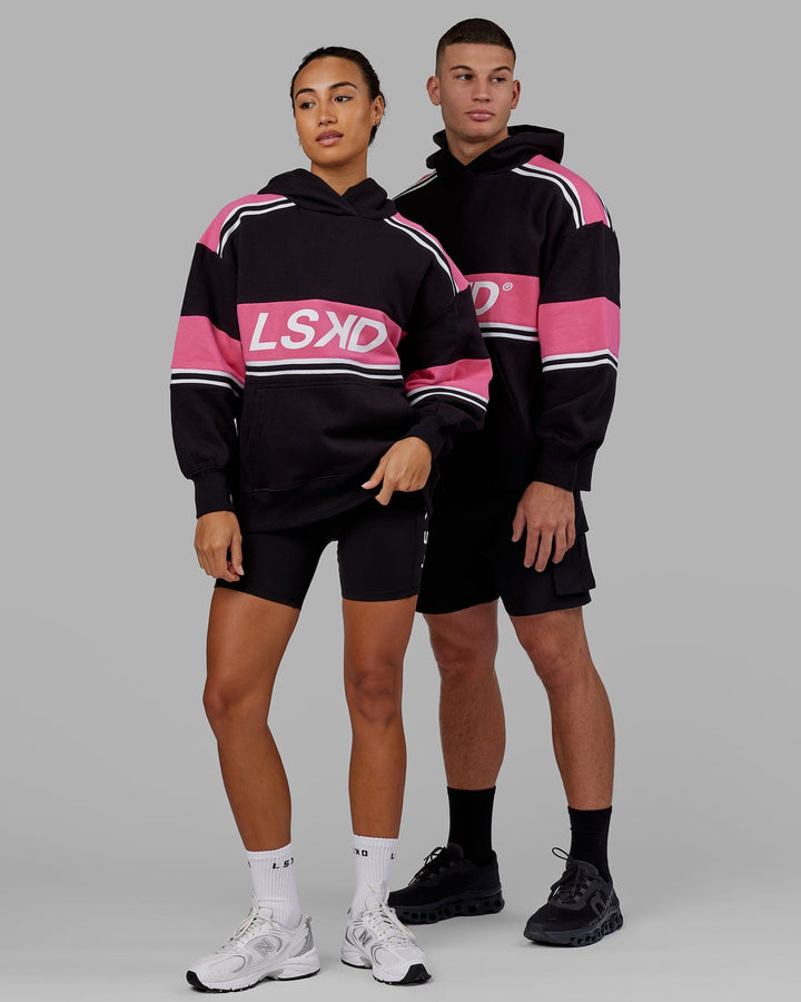 Man and Woman wearing Unisex A-Team Hoodie Oversize - Black-Flamingo