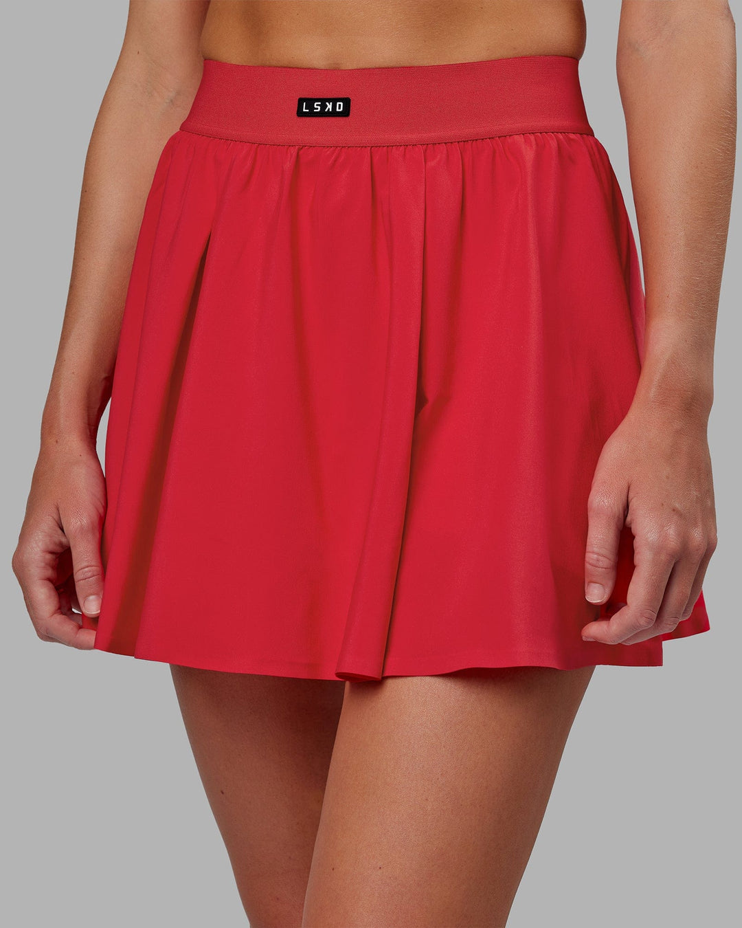 Woman wearing Ace Skirt - Scarlet