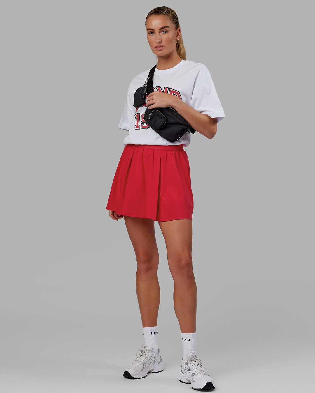 Woman wearing Ace Skirt - Scarlet