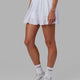 Woman wearing Ace Skirt - White