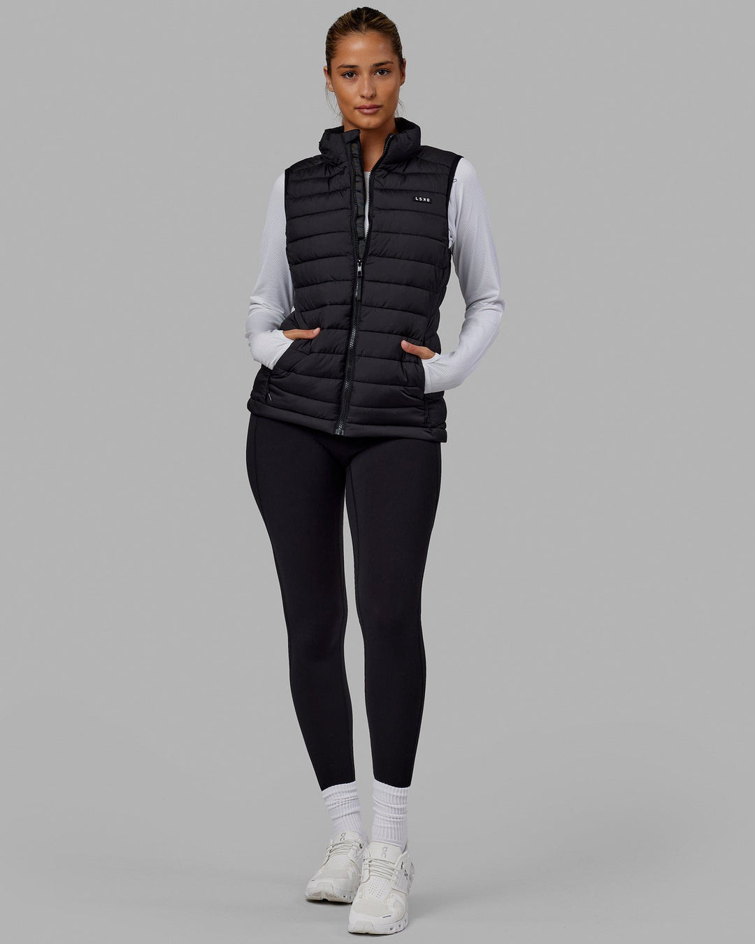 Woman wearing All-day Puffer Vest - Black