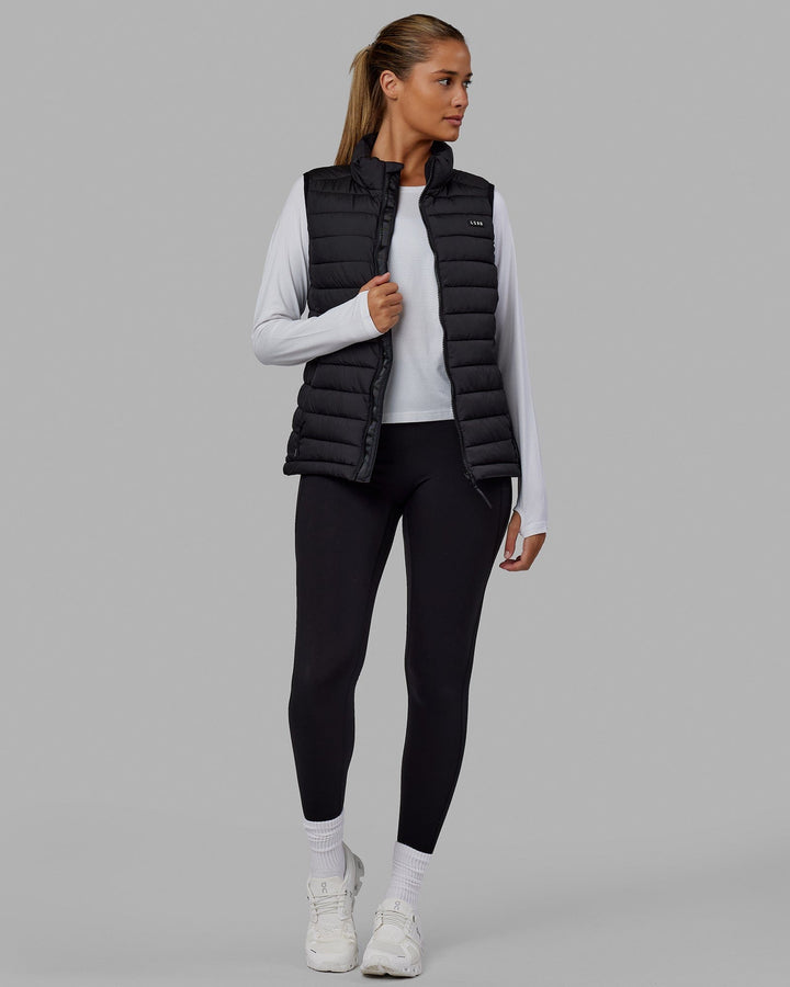 Woman wearing All-day Puffer Vest - Black