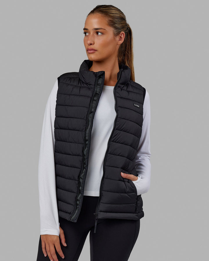 Woman wearing All-day Puffer Vest - Black