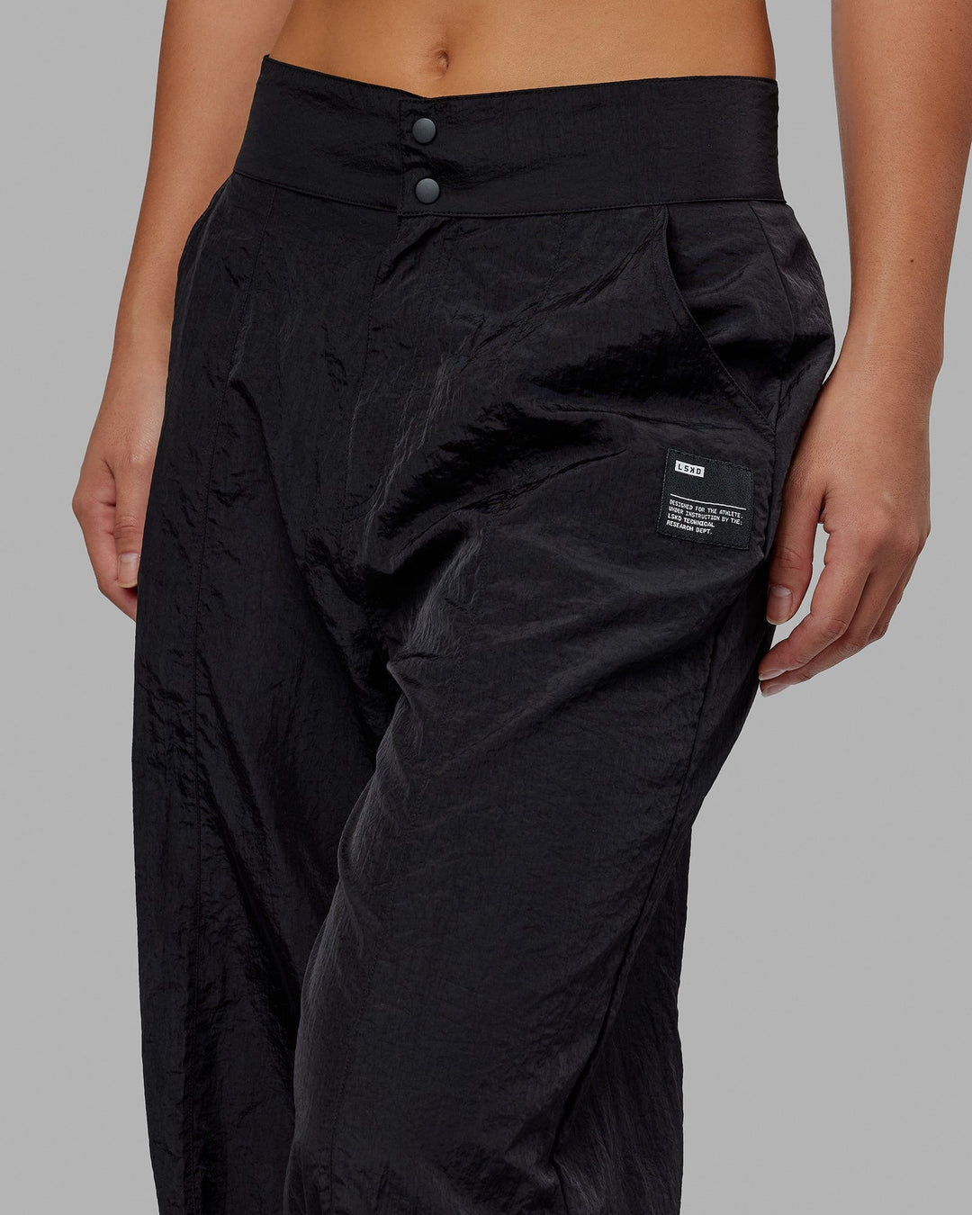 Woman wearing Altitude Parachute Pant - Black