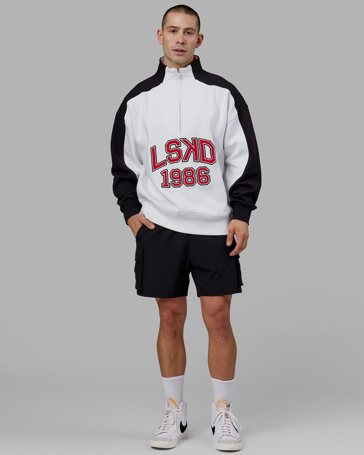 Man wearing Unisex Alumni 1/4 Zip Sweater Oversize - White-Scarlet