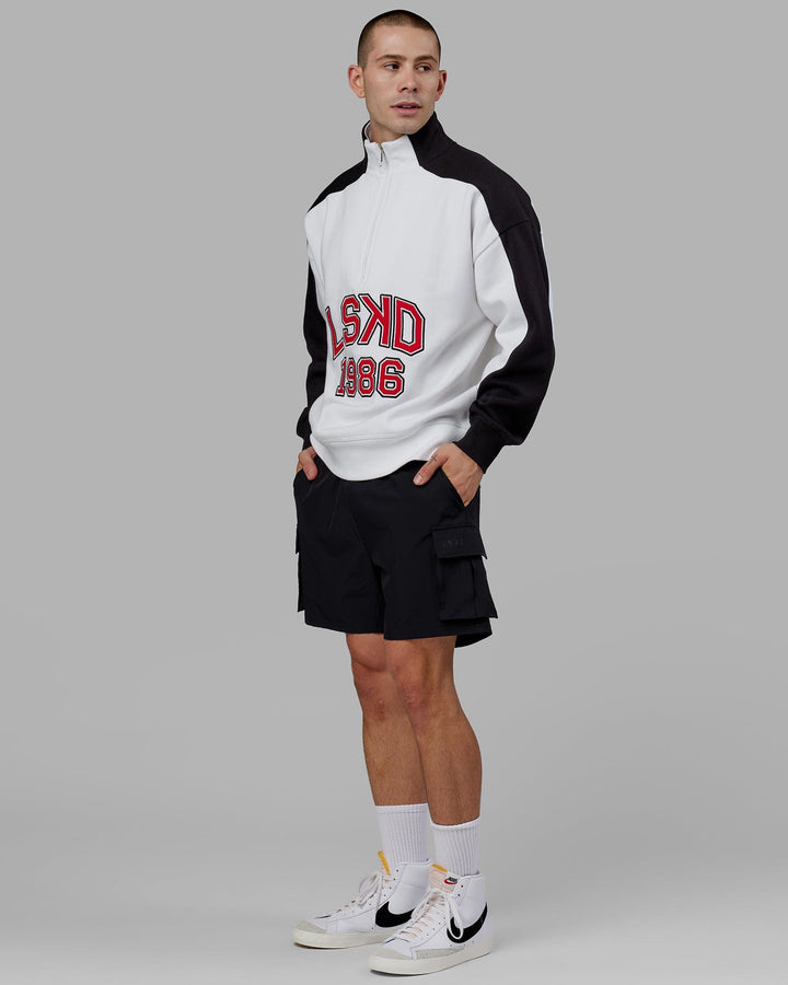 Man wearing Unisex Alumni 1/4 Zip Sweater Oversize - White-Scarlet