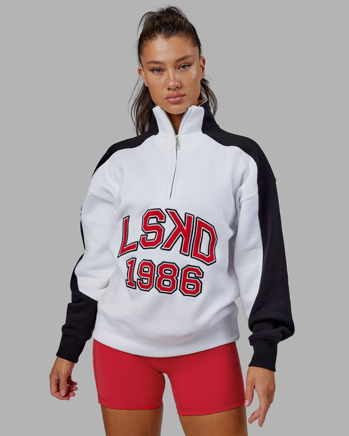 Woman wearing Unisex Alumni 1/4 Zip Sweater Oversize - White-Scarlet