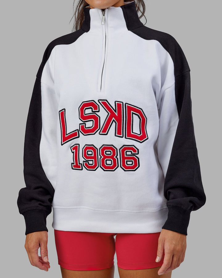 Woman wearing Unisex Alumni 1/4 Zip Sweater Oversize - White-Scarlet