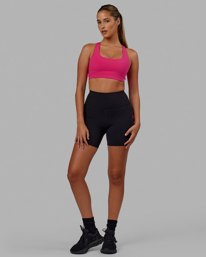 Woman wearing Base Sports Bra - Azalia Pink