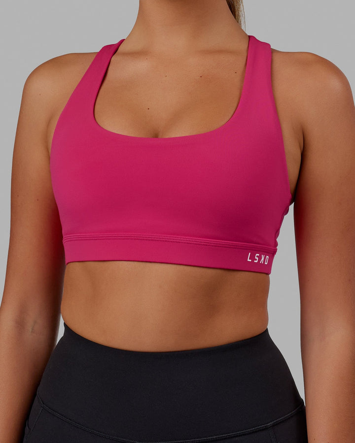 Woman wearing Base Sports Bra - Azalia Pink