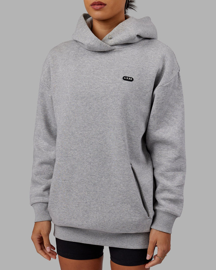 Woman wearing Unisex Capsule Hoodie Oversize - Lt Grey Marl