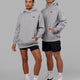 Man and Woman wearing Unisex Capsule Hoodie Oversize - Lt Grey Marl