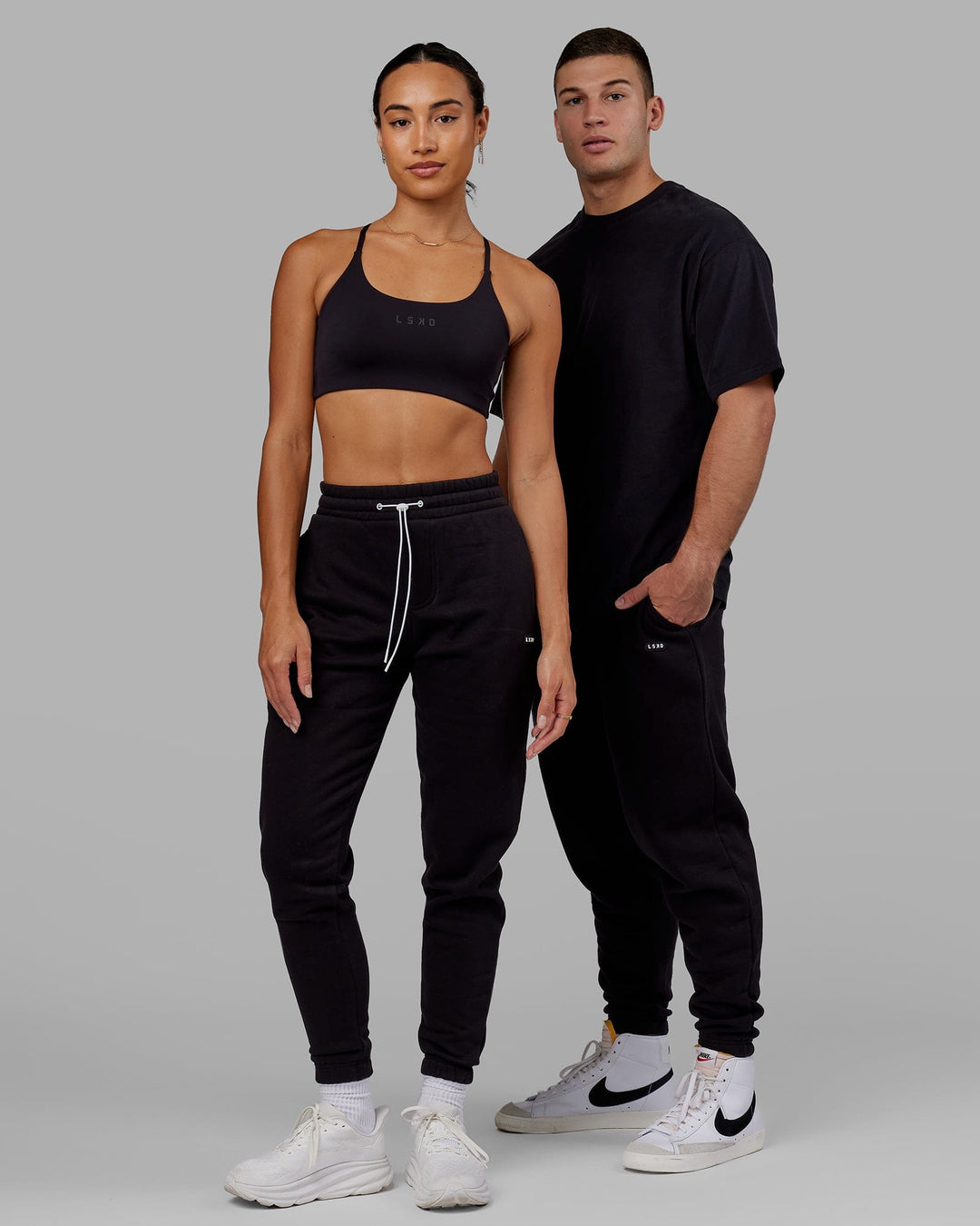 Duo wearing Unisex Capsule Track Pant - Black