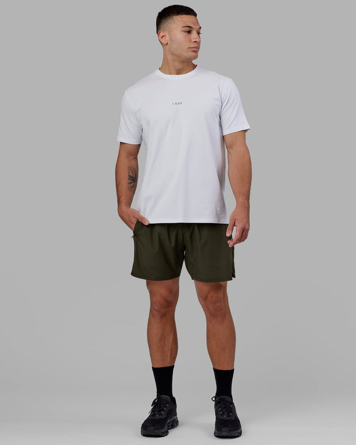 Man wearing Challenger 6" Performance Short with Liner - Forest Night