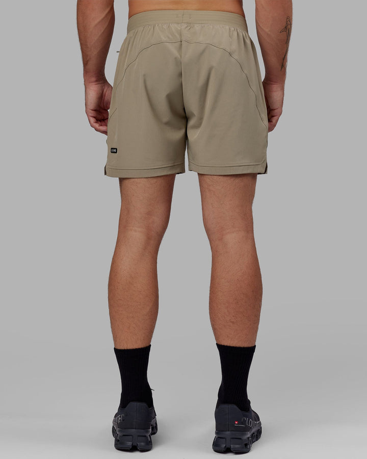 Man wearing Challenger 6" Performance Short with Liner - Laurel Oak