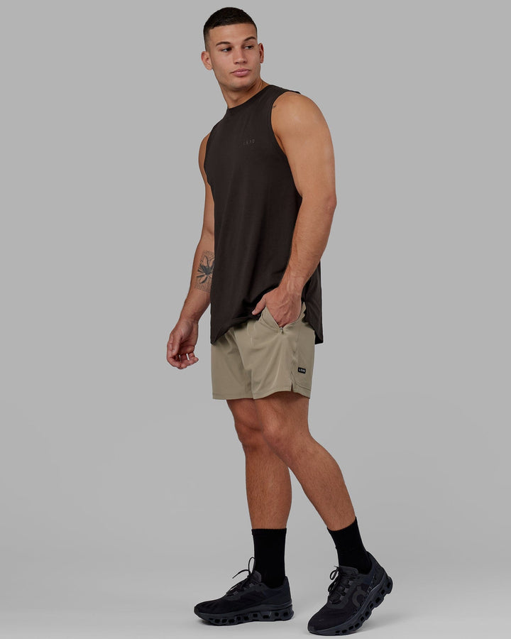 Man wearing Challenger 6" Performance Short Linerless - Laurel Oak