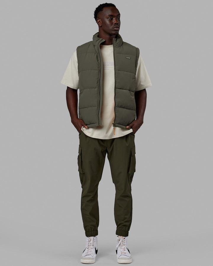 Man wearing Classic Puffer Vest - Tealeaf