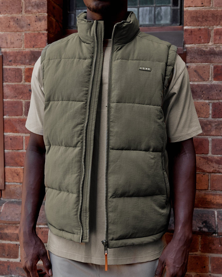 Man wearing Classic Puffer Vest - Tealeaf