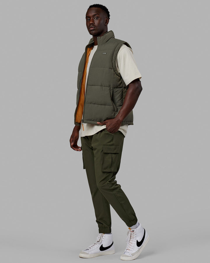 Man wearing Classic Puffer Vest - Tealeaf