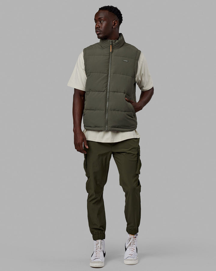 Man wearing Classic Puffer Vest - Tealeaf