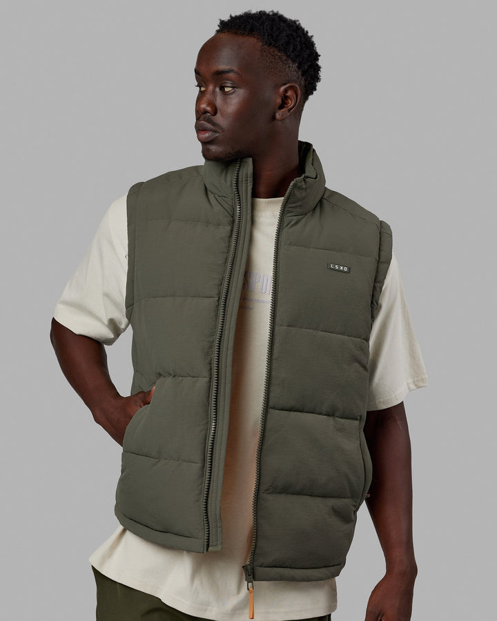 Man wearing Classic Puffer Vest - Tealeaf