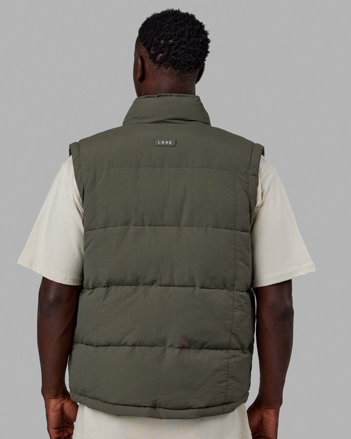 Man wearing Classic Puffer Vest - Tealeaf