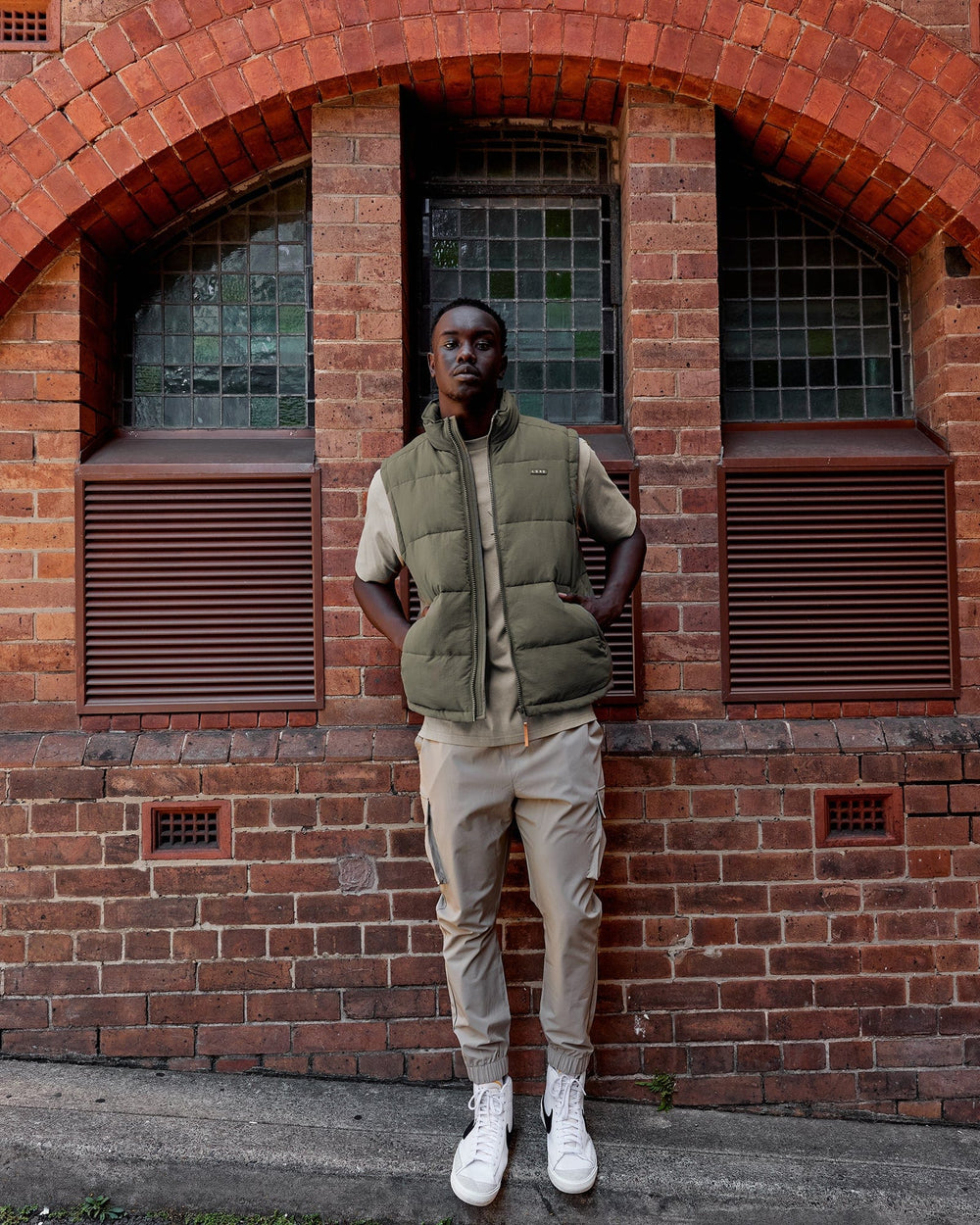 Man wearing Classic Puffer Vest - Tealeaf
